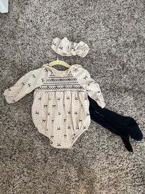 Rachel Zoe Cream Bow-Print Long-Sleeve Bodysuit with black Tights & Headband